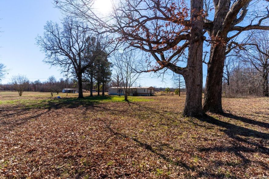 Welcome to Market 1225 Greene 437 Road in Marmaduke, AR! The perfect location for country living on three level acres, surrounded by green trees, and farm land. Country living with big city access.  Close to Paragould, and 33 miles from Jonesboro. The mobile home is being sold as is, at no value. This would be a great location for horses or livestock. This property would be great to make into your forever home or to live in while building your dream home on this beautiful acreage! This property won't last long so call today to invest in your tomorrow!