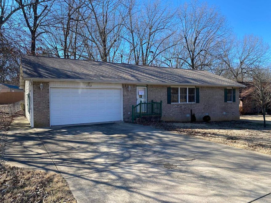 Charming 3BR, 2BA brick front home in a tranquil subdivision. Enjoy privacy in the fenced backyard with a covered deck. Additional storage building. Well-equipped kitchen, perfect for meal prep. Split bedroom plan for added privacy. Cozy up beside the gas log fireplace. Don't miss this gem!