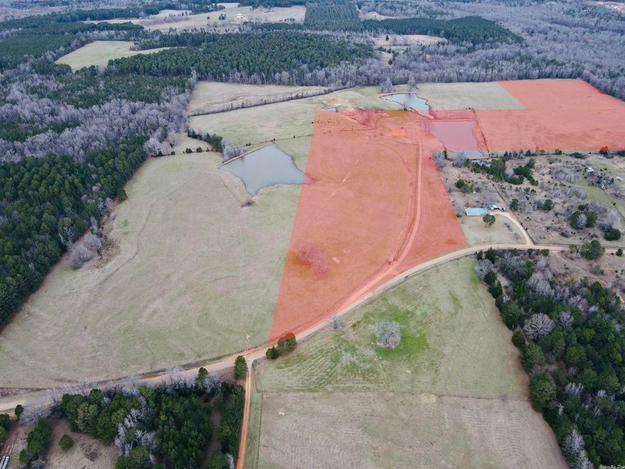 Oh what a JEWEL!!   With PASTURE land being such a RARITY you do not want to miss out on this beautiful 55+- acre property just north of Doddridge AR - approximately 4 miles west of Hwy 71 with easy access to I-49 this property features county road frontage, a pond, and an area leveled for a possible home or shop!  Perfect for you dream home! Home site leveled and waiting!  High speed internet and electric are easily available.   Come take a look to truly appreciate the beauty and tranquility this property has to offer!!!