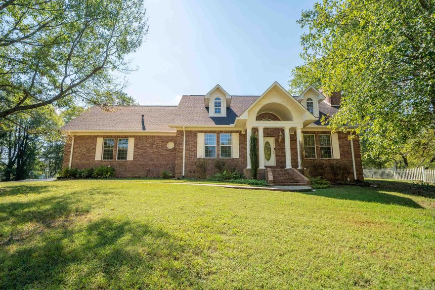 Great Family Home on almost 10-Acres, Fully Renovated Kitchen and Master Bath, New Paint and New Lighting, Heated/Cooled garage, Large Bonus/Game Rm, Recently re-shingled Roof, Extra garage Storage and separate Shop out back, Good mixture of Shade Trees and Pasture, less than a mile to Harps grocery store.