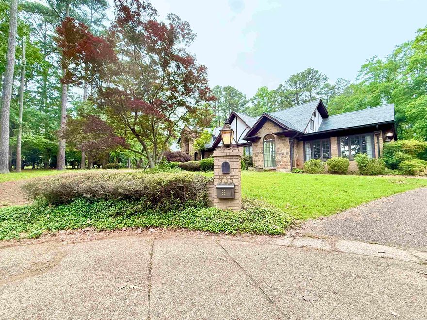 Step into timeless elegance with this custom-built, regal estate designed for both grand living and everyday comfort. A stunning double entrance drive welcomes you in, setting the tone for what’s inside. Built in 1975, this home is filled with character you can’t recreate—soaring ceilings, multiple fireplaces, and impressive double-sided fireplaces that anchor the main living spaces. The kitchen is spacious and ideal for entertaining or preparing large meals, complete with a pantry for added convenience. Enjoy a variety of living spaces including a sunroom, den, formal dining, and formal living room, each offering its own charm and function. The primary suite is tucked away in its own private wing, featuring a personal living area along with standout closets and a spacious bath. Upstairs offers a gorgeous office and two additional bedrooms, providing flexibility for work or guests. Built-in storage can be found throughout the home. Outside, a private tennis court adds the perfect touch to this two-story luxury property full of timeless appeal.
