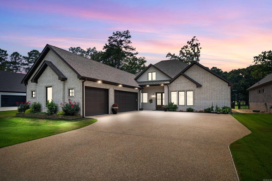 Welcome to 216 Arlington Park Terrace, Hot Springs, AR—a luxurious retreat nestled on the serene greens of the Hot Springs Country Club golf course. This exquisite 4-bedroom, 3-bathroom home offers unparalleled comfort and convenience, complete with a state-of-the-art 22kW whole house generator for ultimate peace of mind. As you enter, you are greeted by a spacious and inviting living area with vaulted wood ceilings, perfect for entertaining or relaxing with family. The gourmet kitchen boasts modern appliances, quartz countertops, double oven, and ample cabinet space, making meal preparation a delight. The master suite is a sanctuary of relaxation, featuring a large closet, and bedroom with views of the golf course, a luxurious en-suite bathroom with dual sinks, a soaking tub, and a separate shower. Three additional well-appointed bedrooms provide plenty of space for guests or a growing family. Step outside onto the expansive flagstone patio and enjoy breathtaking views of the golf course while entertaining friends or simply unwinding after a long day. The professionally landscaped yard enhances the beauty of the surroundings, creating a tranquil atmosphere.