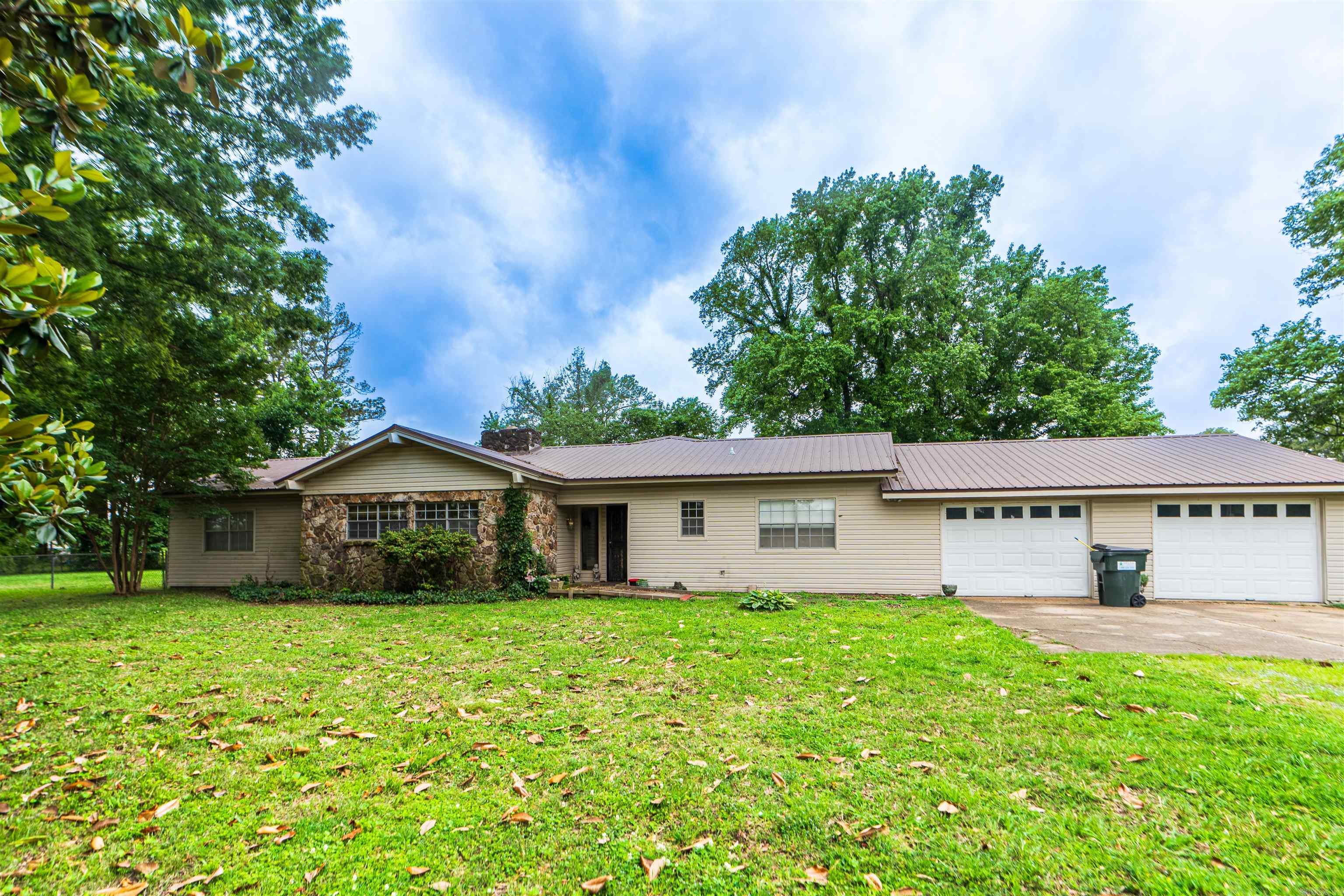 Rural Arkansas home located approximately 2 miles from Historic Downtown Marianna. Ample storage can be found throughout the home, along with a shop outside. A spacious kitchen and sprawling living area are sure to make you feel at home. The beautiful wood burning fireplace is a welcome accent to the living area as well and is sure to bring a cozy feel to the space during those cooler Arkansas months.