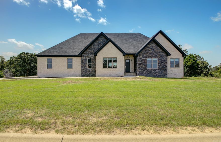 Tucked inside the gated Seven Point Lake community, this beautifully updated custom home checks all the boxes. With 4 bedrooms and 2 baths, the layout is both stylish and functional, featuring a spacious family room with luxury vinyl flooring that flows right into the kitchen—perfect for everyday living and entertaining. The kitchen offers a breakfast bar, plenty of storage, a walk-in pantry, and a clever passthrough cabinet that makes cooking and hosting a breeze. The primary suite is your private escape with a custom-tiled walk-in shower featuring a rain shower head, a generous walk-in closet, and direct access to the back porch where mountain views steal the show. Surrounded by natural beauty and tucked behind the gates, this home offers comfort, privacy, and that “this is the one” feeling the moment you walk in.