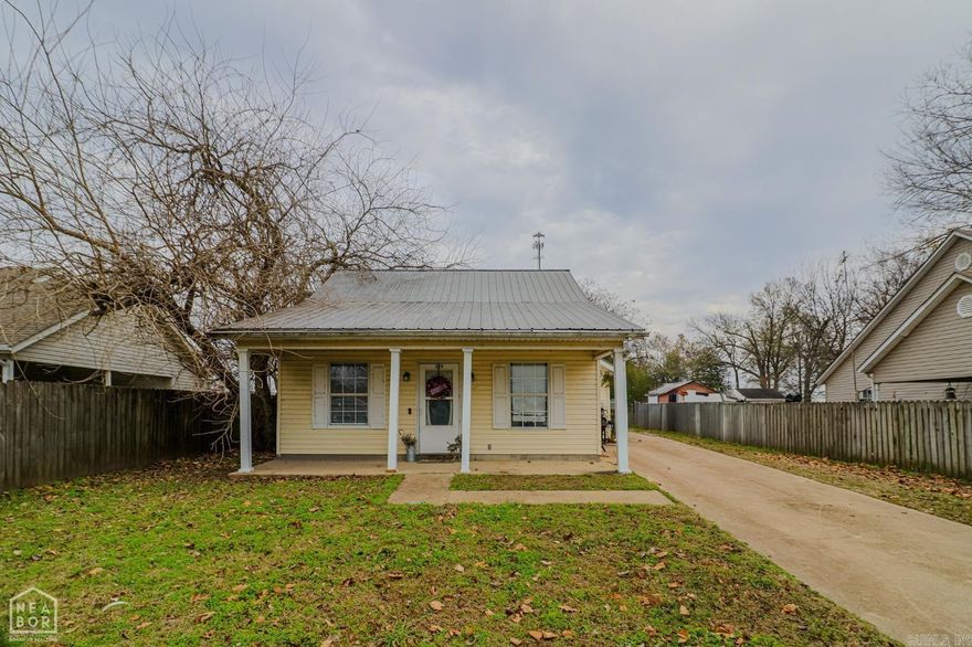 Charming 2-Bedroom Gem in the Heart of Trumann! Welcome to 329 Sharon - an adorable, move-in-ready home that's bursting with small-town charm and big-time value! This beautifully maintained 2-bedroom, 1-bath cottage offers approximately 900 sq ft of efficient, comfortable living space - perfect for first-time buyers, downsizers, or savvy investors looking for an easy-to-manage property. Step inside and fall in love with the bright and cozy layout. The living area flows effortlessly into the eat-in kitchen, creating a warm and inviting atmosphere for everyday living. Both bedrooms are generously sized with great natural light, and the full bathroom has been thoughtfully updated for modern convenience. Recent upgrades include a durable metal roof that provides peace of mind and low maintenance for years to come. Outside, you'll find a manageable yard with plenty of room for gardening, pets, or simply relaxing on a quiet evening. Located in a friendly Trumann neighborhood, you're just minutes from schools, shopping, parks, and everything this welcoming community has to offer. Affordable, cute, and ready for its new owner - homes like this don't last long! Don't miss your chance!