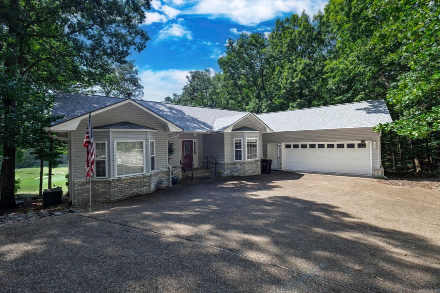 ?? 23 Delgado Way, Hot Springs Village – Golf Course Living at Its Finest! Welcome to your dream home on the green! Nestled along the 3rd hole of the stunning Cortez Golf Course, this beautifully updated home offers space, comfort, and breathtaking views.  Step inside to a grand living room flooded with natural light from abundant windows, framing serene views of the fairway. The home features an expansive, updated kitchen perfect for entertaining, brand-new carpeting, and stylishly renovated bathrooms throughout.  Upstairs, you'll find all the bedrooms—including a spacious master suite with direct access to the back deck, the perfect place to start your mornings with a cup of coffee and the sights and sounds of nature.  Need more space? The finished walk-out basement includes its own full bathroom and flexible area ideal for an additional bedroom, guest suite, home office, or craft room.  Whether you're an avid golfer or just enjoy peaceful, scenic living, 23 Delgado Way is a must-see. This home truly has it all—don’t miss your chance to make it yours!