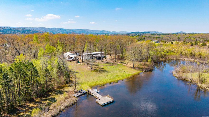 Discover a rare opportunity to own a versatile 60-acre property in the heart of Montgomery County at 3056 Hwy. 270 E in Mount Ida, Arkansas. This unique offering features a thriving 38-unit covered boat and RV storage business, providing immediate income potential with ample room for future expansion. The land itself is a true outdoor paradise, highlighted by a scenic 7+ acre stocked pond—perfect for fishing, relaxing, or enhancing the property’s recreational appeal. Abundant wildlife, including deer, and ducks makes this an excellent hunting retreat or a peaceful getaway for nature enthusiasts.  A large shop and additional storage buildings offer plenty of space for equipment, maintenance, or business operations, adding even more functionality to this already diverse property. With highway frontage and easy access, this location is ideal for continued commercial use, investment, or a combination of business and personal enjoyment.  Whether you’re looking to expand your investment portfolio, step into a turnkey business, or enjoy the beauty and privacy of rural Arkansas, this property offers unlimited potential in a highly desirable area near Lake Ouachita and the National Forest.