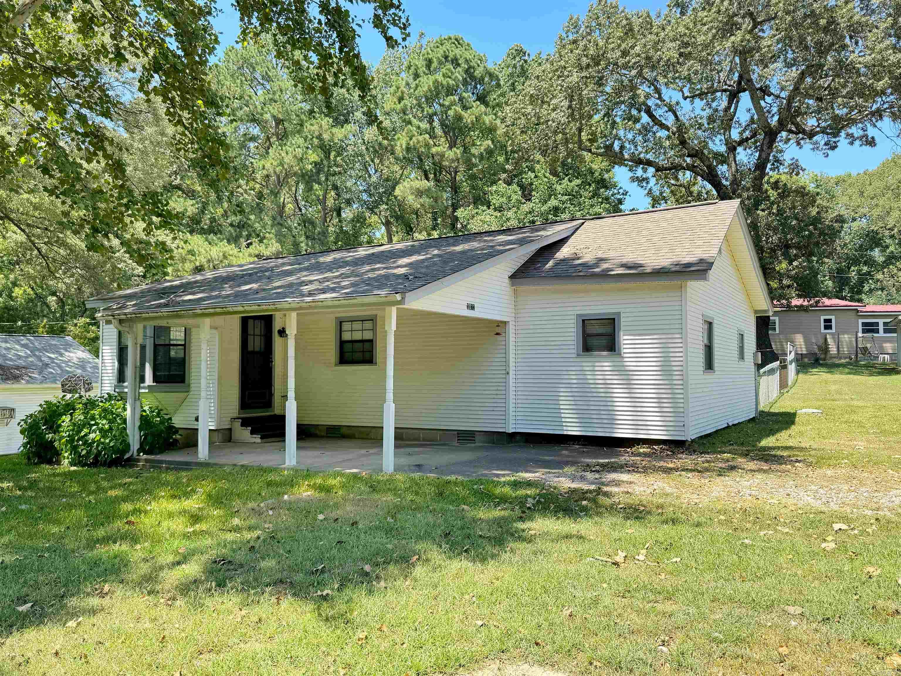 Charming Move-In Ready Home on a rare Double Lot in Bauxite! Looking for the perfect starter home or investment property? This well-maintained 3-bedroom, 1-bath gem offers 1,221 square feet of comfortable living space and includes the buildable lot next door ā giving you extra room to grow, expand, or build. Inside, youāll find a spacious layout with a large eat-in kitchen, classic wood cabinetry, and plenty of counter space. The cozy living area features updated flooring, a bay window for natural light, and a ceiling fan. The oversized laundry room includes washer, dryer, and extra cabinetry for storage. All appliances ā including refrigerator, washer, and dryer ā convey with the home, making your move simple and stress-free. Enjoy a fully fenced backyard, two storage sheds, and a detached workshop, perfect for hobbies or extra storage. A brand new HVAC system (2024) ensures year-round comfort and energy efficiency. Property is rural development eligible. Quietly located in Bauxite with easy access to Benton and Bryant, this property combines affordability, space, and potential.