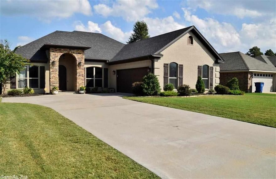 Gorgeous home w/open floor plan.  Granite & crown molding featured in every room.  French pocket doors were added to room on the kitchen making a beautiful office or small eat in kitchen area.  Dining area is separate offering plenty of places for family time.  Master bedroom is across from other rooms for extra privacy.  The backyard features a new deck w/linen privacy curtains for the perfect back yard experience.  Small deck addition to back porch for grilling, fire pit or perfect spot for Jacuzzi.