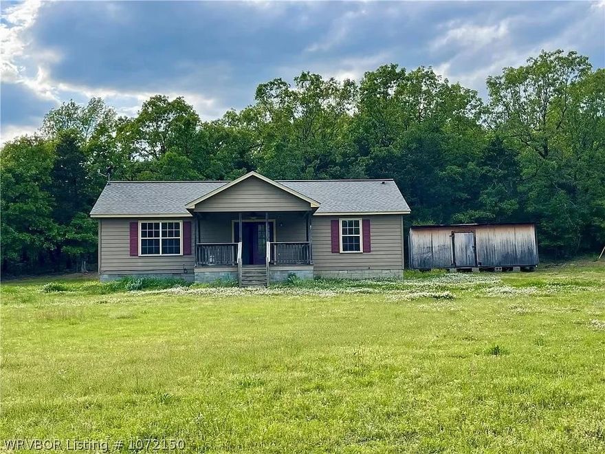 Entry only - single family home in Charleston, AR. No flooring, no appliances, needs TLC.