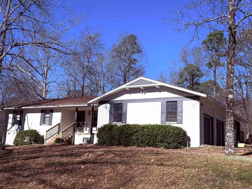 This beautiful brick home is a must see. This renovated 3 bedroom, 2 Full Bath has a beautiful open and modern layout. It sits on a corner lot and is over 2,000 sqft with an enclosed porch on the back. It also has a beautiful workshop, fireplace, and back deck. This home will not last long!!!