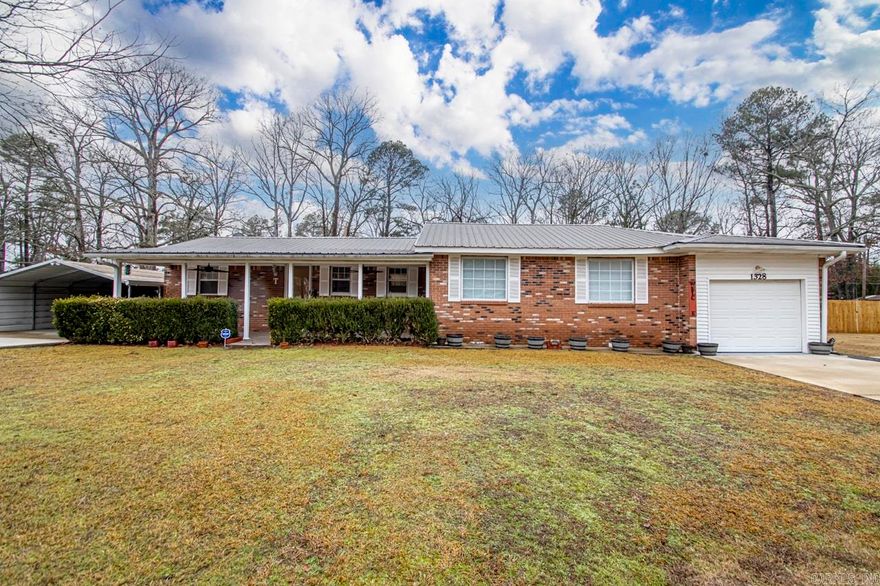 Charming older brick house with timeless appeal. This 3-bed, 3-bath home spans 2036 sq ft, featuring a classic design and a durable metal roof under warranty. Granite countertops. Large walk-in tub installed in 2020. The property boasts an in-ground pool, pool house, 24x30 shop, and shed, creating an ideal outdoor oasis. A new septic system was installed in June 2023. Don't miss the perfect blend of character and comfort in this well-maintained residence.