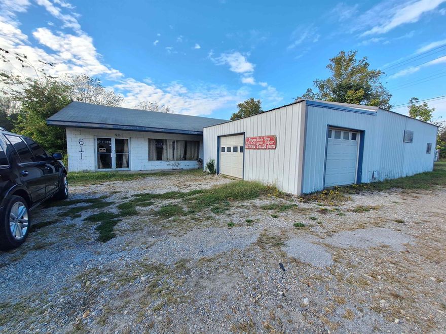This versatile property offers a rare opportunity for both residential and commercial use. Previously operated as a business on one side and a residence on the other, it also includes a front shop that once served as a paint and body shop. The home will require renovation, making it ideal for buyers looking to customize or invest. Located less than a mile from White River access and just 13 miles from Lake Norfork Dam, this spot is perfect for outdoor enthusiasts and entrepreneurs alike. Plenty of potential for a live/work setup, studio space, or small business. Agent is related to the seller.