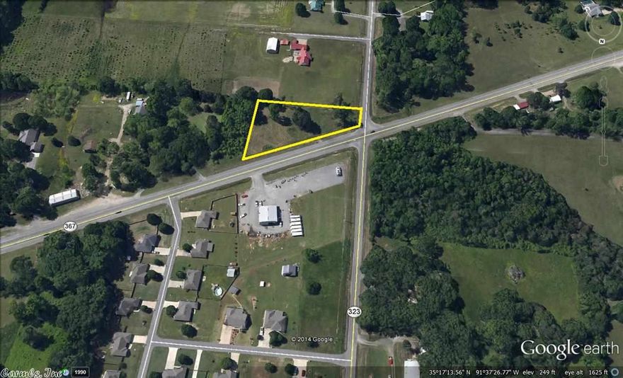 Excellent corner lot located outside the city limits of Judsonia.  Property has city water and sewer.  Great location for business, rental units or a home.