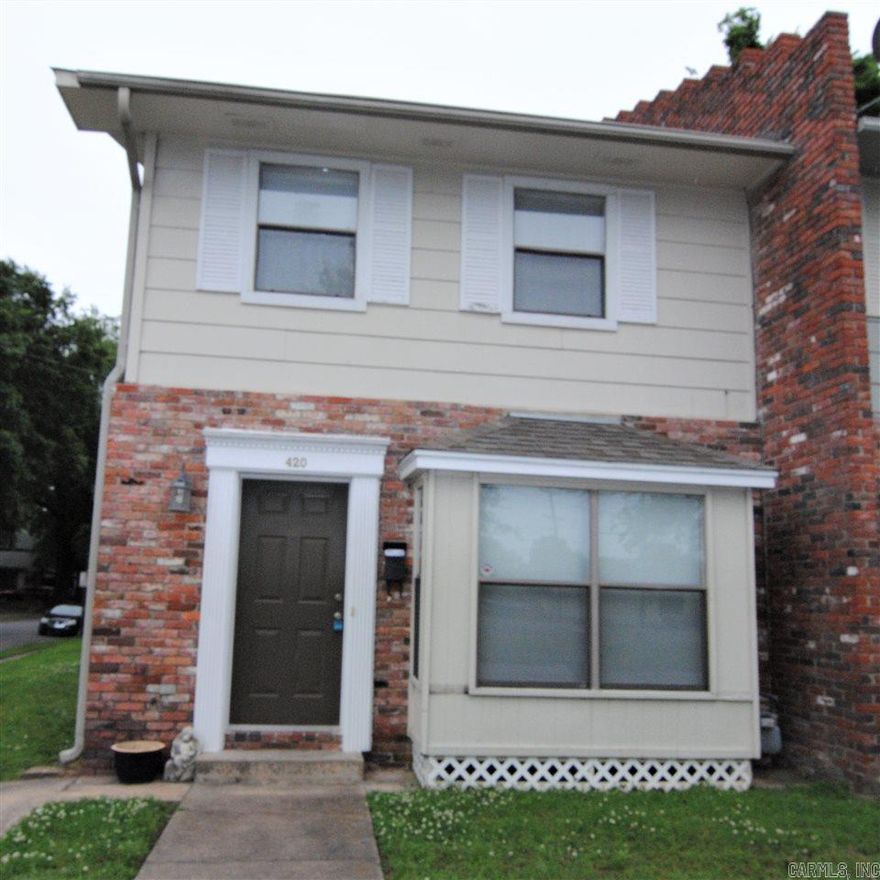 Spacious town home in the Historic Argenta District.  2 blocks to Dickey Stephens Ballpark, 3 blocks to Main Street.  Large living area with picture window, 1/2 bath down, furnished kitchen w/extra pantry & washer/dryer closet (hookups only-electric).  Two bedrooms upstairs each with private 1/2 bath and entry to bath/shower.  Gated back patio for privacy.  Assigned parking, lawn care included.
