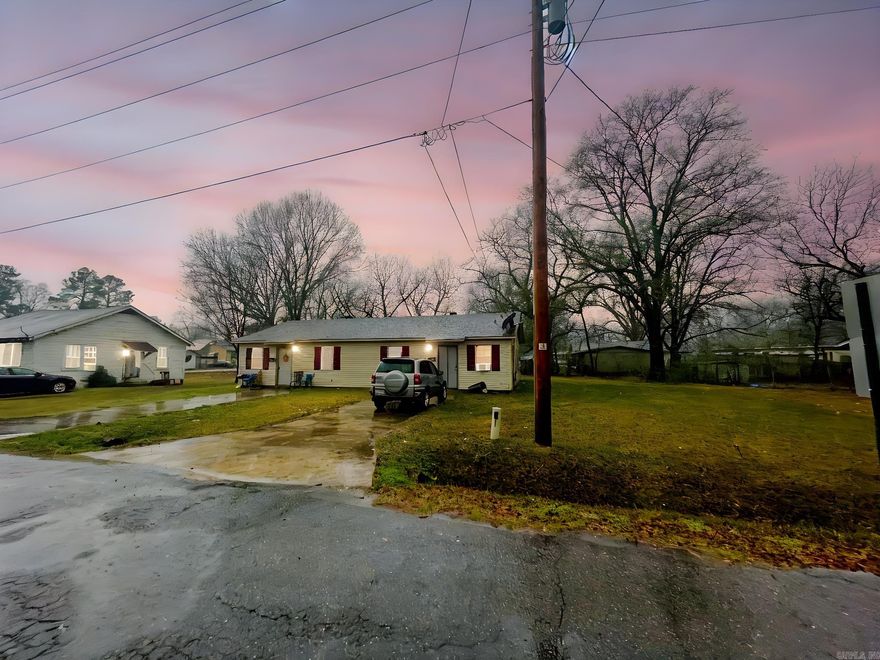 Investor-ready duplex opportunity in Hope, Arkansas delivering stable cash flow and long-term rental demand. Located at 402 N Ferguson Street, this well-maintained duplex was built in 2008 and features two 2-bedroom, 1-bath units with approximately 1,500 total square feet. Both units are occupied by long-term tenants with current rents totaling $1,100 per month ($550 per unit), providing immediate income from day one.  The Hope market supports approximately a 10% cap rate, making this property attractive for investors seeking strong yield, affordability, and minimal turnover. Practical layouts, newer construction relative to the market, and consistent tenant demand contribute to stable performance.  Hope is a recognized agricultural community known for the annual Watermelon Festival and an outdoor-driven lifestyle centered around hunting and fishing. The area benefits from proximity to regional employment and population centers including Texarkana, Shreveport, Little Rock, Hot Springs, and Arkadelphia, supporting ongoing rental demand.  Ideal for investors seeking a turnkey duplex, portfolio expansion, or entry into Arkansas income-producing real estate.