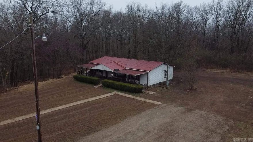 We are excited to present this charming home situated on 4.5 acres of land. Although it may need a little work, this property offers endless potential. The mobile home boasts a spacious interior with providing ample space for you and your loved ones. The property spans an impressive 4.5 acres, offering plenty of room for outdoor activities, gardening, or even expanding the existing home. Enjoy the tranquility and privacy that comes with owning a large parcel of land. Embrace the beauty of nature right at your doorstep. While this mobile home does require some work, it presents a fantastic opportunity for those who want to put their personal touch on their home. With a little creativity and effort, you can transform this property into your own private oasis. Conveniently located in a peaceful and serene town of Bald Knob, this property provides the perfect balance between privacy and accessibility. This property represents an excellent investment opportunity. With some renovations, you can turn this mobile home into your dream residence and potentially increase its value over time.