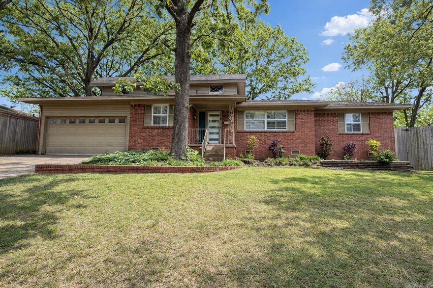 Beautifully remodeled home in the desirable Lakewood subdivision of North Little Rock! This spacious 3- bedroom, 3 bath property features a rare and highly sought after layout with two primary suites, perfect for multi-generational living or added privacy for guests. The home has been thoughtfully updated with modern finishes while maintaining its classic charm. Enjoy multiple living spaces, a functional floor plan, wet bar, and abundant natural light throughout.  Step outside to a large, tree shaded yard with mature landscaping, ideal for relaxing or entertaining. The property also includes a new roof, and HVAC providing peace of mind for years to come.  Conveniently located near parks, shopping, dining, and all that Lakewood has to offer, this move-in-ready home is a must-see!