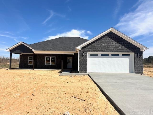 Experience serene living in this charming 4-bedroom, 2- bathroom home located in Winchester Estates Subdivision. This charming new construction sits on 1.36 acres backing up to tranquil woods where you can enjoy watching the wildlife from your back porch. Home features an open floor plan, walk-in pantry, and ss appliances. Stepping into the primary suite, you'll find his-and-hers walk-in closets, tile walk-in shower and soaking tub. Bauxite school District!! $5000 BUILDER INCENTIVE WITH AN ACCEPTABLE OFFER!!