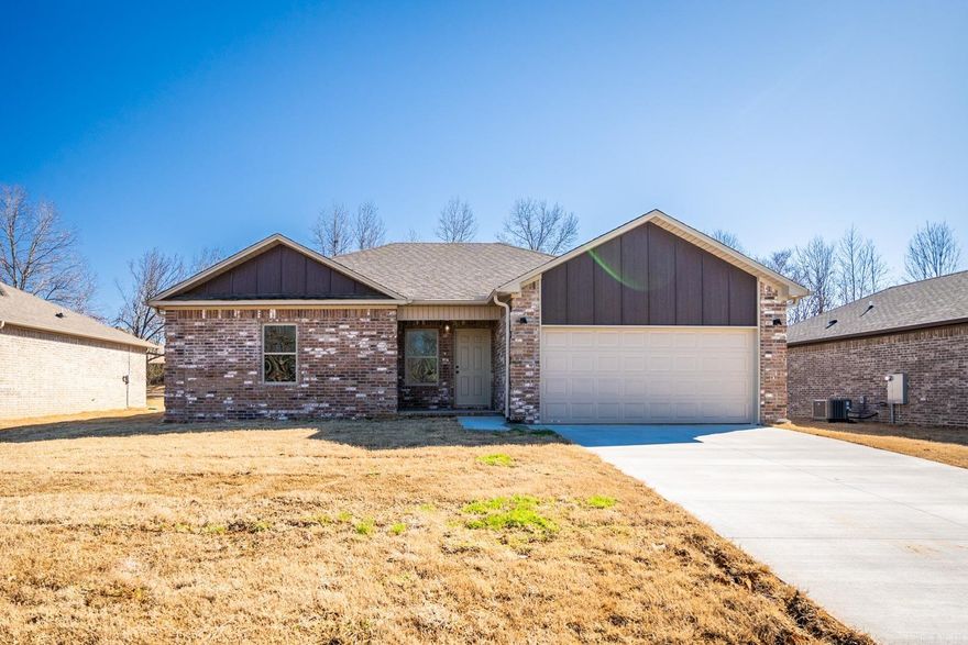 Discover the allure of this stunning new construction in Magnolia Estates. The open floor plan showcases contemporary finishes and a well-designed split layout, featuring a separate master bedroom. Situated in the Cabot school district, this 3-bedroom, 2-bathroom home is conveniently close to shopping and the interstate. The kitchen boasts stainless steel appliances, a countertop+bar  combo, and ample storage. High ceilings and an electric fireplace enhance the living room's charm. The master bathroom indulges with dual vanities, a tiled walk-in shower, and a walk-in closet. Additional bedrooms offer generous closet space. With gutters already installed, this home is move in ready! The covered back patio overlooks a 1/4 acre lot, providing space for sheds, pools, and more! Eligible for Rural Development with $0 Down Payment.