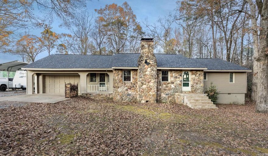 Discover your own private sanctuary with this beautifully remodeled home, nestled on five serene and level acres. Every inch of the interior shines with brand-new updates, including fresh flooring and paint throughout, a modern kitchen, and 2.5 fully renovated bathrooms. The peace of mind is unparalleled, thanks to major updates like a brand-new roof (2025), HVAC, electrical, and plumbing systems all updated in 2021, a freshly serviced septic (2025), and a cleaned fireplace (2025), making this a true move-in-ready oasis. For the visionary, the property features the incredible bonus of a shop with its foundation already completed, awaiting your personal finishing touches. This stunning, tucked-away retreat offers the perfect blend of modern comfort and boundless potential—you won't want to miss it!