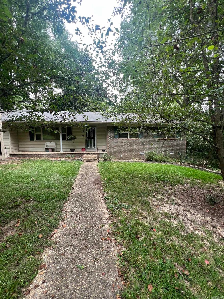 Wonderful 3 bed/2bath home on a great lot with 2 beautiful Magnolia trees.  This home features great cabinet storage in kitchen area.  There is an eat in area with fireplace. Great storage room off of the laundry area. Gutters have leaf guard.  House being sold as is condition.