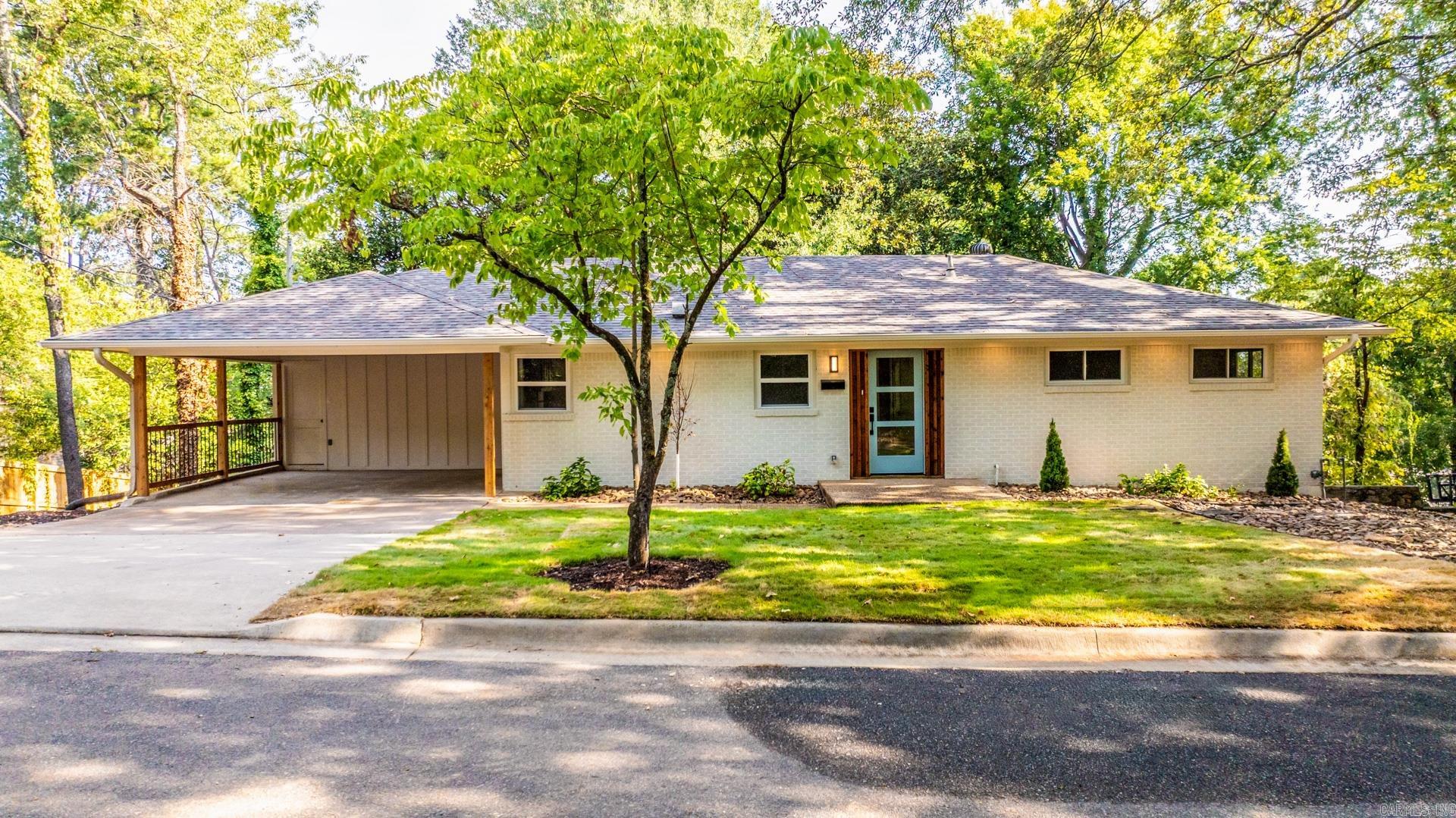 Located in one of the most highly desired neighborhoods in Little Rock and just a golf cart ride from the Little Rock Country Club, this completely restored home combines timeless charm with modern luxury. The all-new kitchen opens directly to the living room and back porch, creating the perfect flow for entertaining. Original hardwood floors have been brought back to life and finished to an even higher standard than new. The main-level primary suite is truly a retreat, featuring his-and-hers closets, double vanities with a makeup area, a spacious shower with a designer accent wall, and abundant natural light. Downstairs offers a second living space with new custom herringbone hardwood floors, while every bathroom, surface, and finish throughout the home has been thoughtfully updated. Outside, enjoy evenings around the built-in fire pit in the private backyard. This home is a rare opportunity to own a high-end, move-in-ready property in one of Little Rockās most exclusive areas.