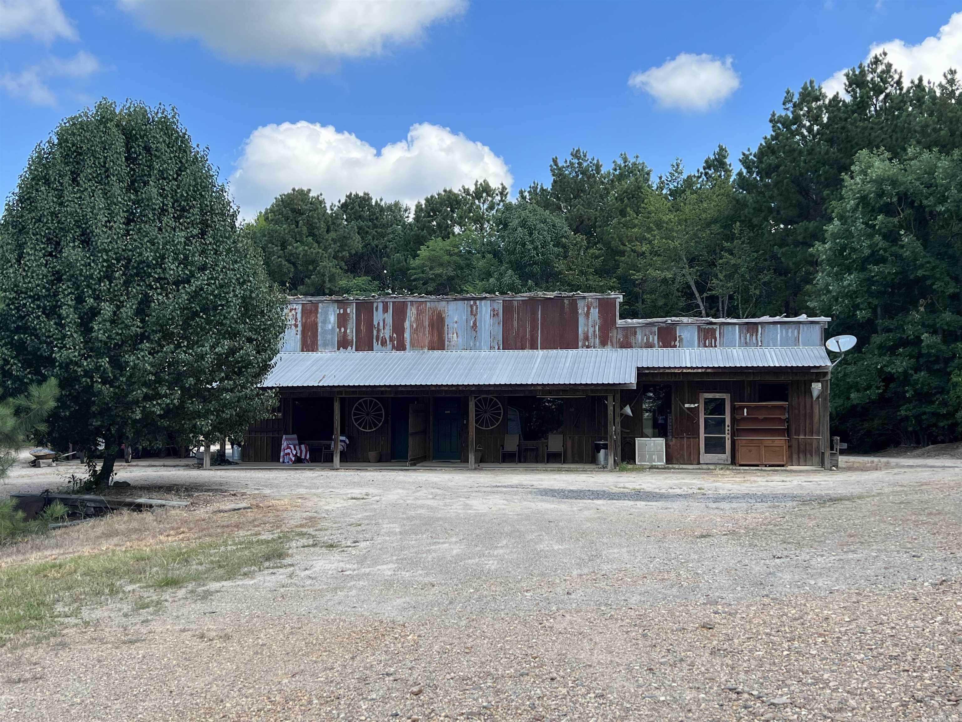This charming salon-style cabin offers the perfect opportunity for short-term rentals or a personal retreat. Selling fully furnished, Located just 4 miles from Lake Greeson and less than a mile from two public accesses to the Little Missouri River, itās an outdoor loverās dream. Enjoy easy access to floating, fishing, and exploring the natural beauty of the area. Whether you're seeking relaxation by the lake or adventure on the river, this cabin combines comfort, convenience, and adventure in one serene setting.