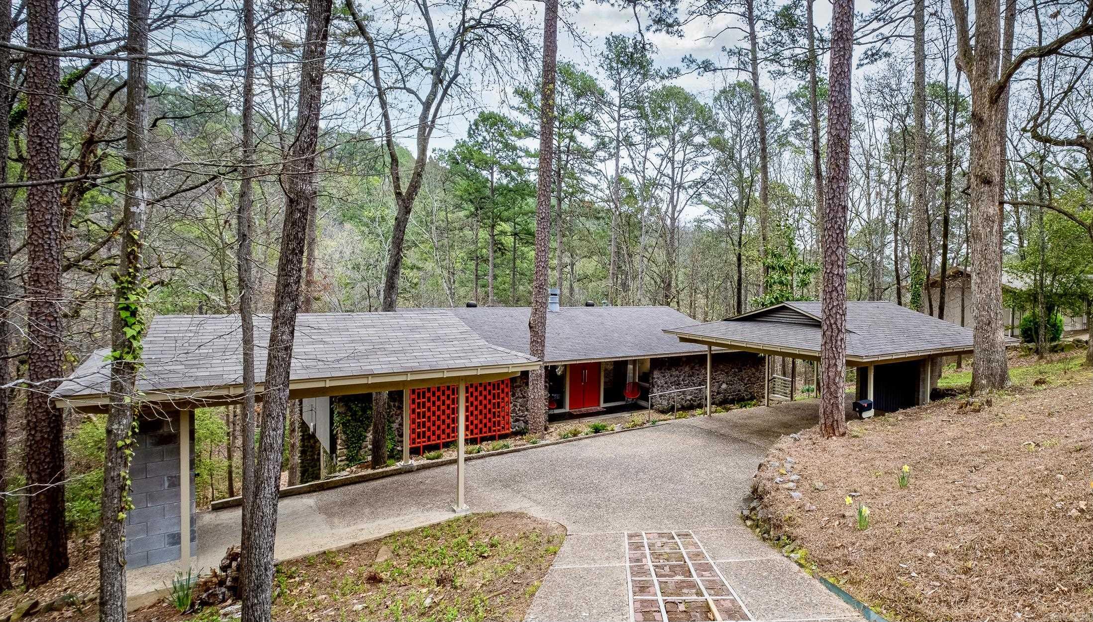 Mid-Century Modern STUNNER w/ POOL!!! Nationally registered as the "Thomas Gray House", and designed by the prominent architect as his personal residence, this extraordinary retreat has it all. Situated on 1/2 acre in coveted River Ridge, this exquisite property has been thoughtfully restored and remodeled to adapt to today's living and entertaining. High end appliances and designer finishes elevate this home to an unparalleled level of sophistication. Open Floor plan, 2 living spaces, 3 bedrooms all with ensuite bath, separate main level primary suite w/ large custom closet, office, downstairs guest suite, den w/ kitchenette plus bonus storage/workout room. Glass doors and windows across the entire back offer scores of natural light and invite you to enjoy a peaceful greenbelt view or step out to relax by the poolside. Call us today to book a showing. This one will go fast!