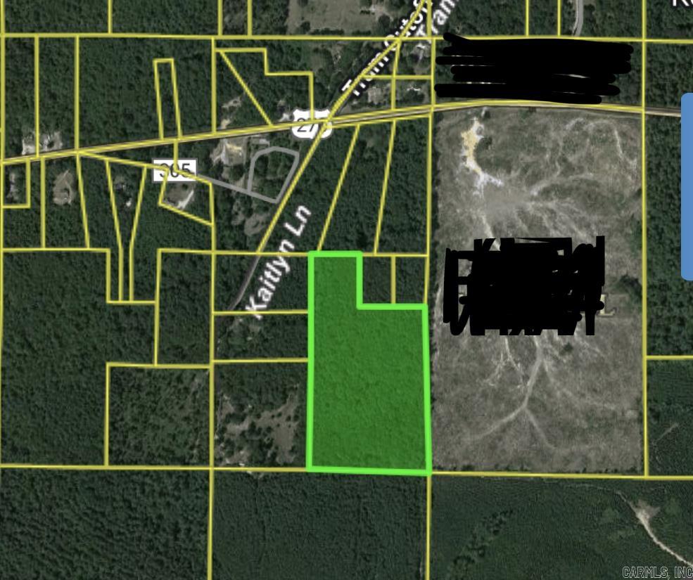 Plenty of options here on this 18.5 acre tract of timber only a few minutes from town and the 270 bypass. Whether you're wanting privacy and seclusion, off-grid living, homesteading or just investment property, this could be the place for you. There is a lack of legal easement.