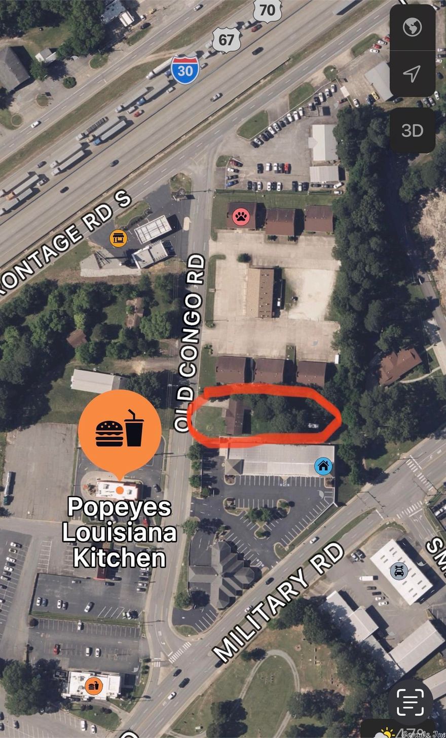 This home has been used as a Residence and has an area that was turned into a small salon....Could be used as a separate office. Location, Location, Location!!! Property just across the street has been purchased by a Hotel Company, talk about the potential here!!! Over HALF AN ACRE!!!! DON'T MISS OUT ON THE OPPORTUNITY HERE!!! **please measure for square footage accuracy.**please check zoning ordinances for clarification. Being sold "as-is"