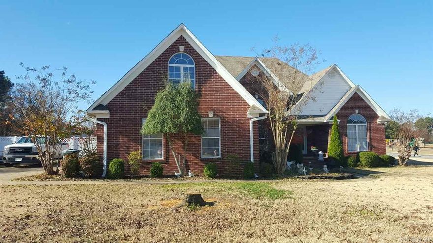 Great 4 bedroom 3 bath brick home sitting on a corner lot. Split bedroom plan, 4th bedroom and 3rd bath upstairs. Formal dining room with an eat in kitchen including a breakfast bar. Living room has a gas fireplace and the yard is fully fenced with lots of landscaping and a deck. New handscrapped wood floors in living room and dining room make this a great home.