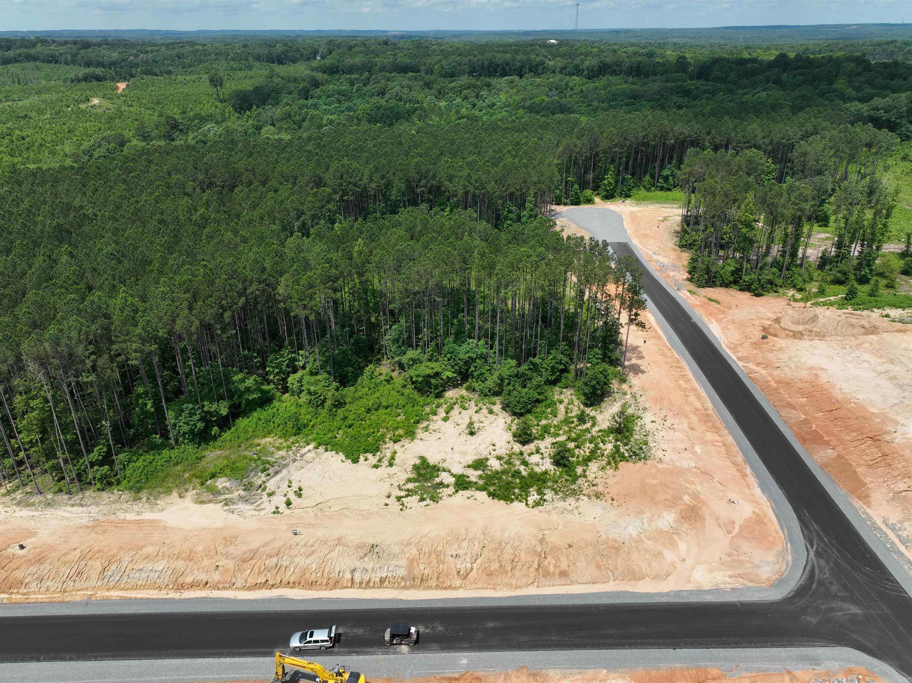 Pre-selling lots in Mountain Pine Estates. Wooded lot in Saline County, south of Little Rock. Asphalt road and utilities installed. electricity, water, sewer, fiber optic.