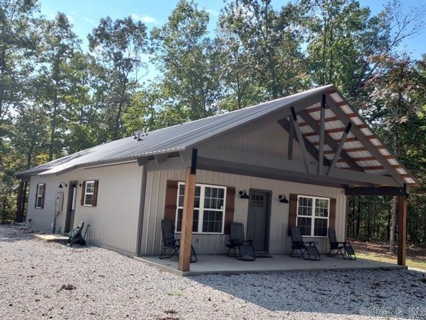 Check out this beautiful newly constructed home.  This home is set on a quiet and tranquil wooded 2.74 acres.  Just minutes from town and minutes from the famous White River. This lovely home offer a very open concept floor plan, featuring 3 bedrooms, 2 baths, CH&A plus gas log FP, vaulted ceiling, inviting front porch and covered back patio. Convenient if you want to listen to the music, fish or enjoy the Ozark Nat. Forest, you will think you are on vacation year-round.  Call  to Schedule a showing today!