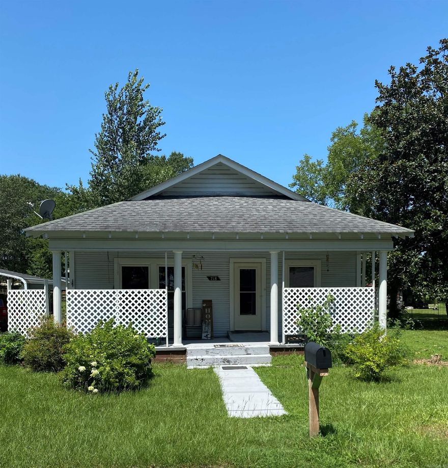 You get the feeling of home when you walk in this 3BRM 1BTH. Situated on a large city lot. This home has had many updates over the past few years. Electrical 2008, windows and insulation 2016, new roof 2017, water heater and HVAC 2016 Hardwood Floors, Carpet, Linoleum through out. Kitchen/Dining combo with an open feel. Lots of windows for natural light.  Utility room, Storage building, Double Carport approximately 21ft by 21 ft. Covered slab area approximately 12 ft by 20 ft which would be great for a grilling/sitting area. Home is all electric except the stove is gas but there is an electrical hook up if electric stove is prefered.  Refrigerator, Washer and Dryer convey with the property.