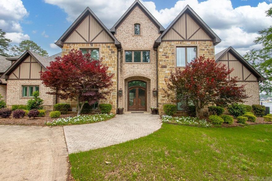 Luxury living at its finest in this exceptional custom-built estate. Featuring 6 bedrooms, each with a private ensuite, plus a theater/game room and upstairs bonus with surround sound throughout. Showcasing an impressive 5-car garage and 2 laundry rooms-one upstairs and one downstairs for added convenience. The primary suite is a true retreat with patio access, sitting area, and dual closets, hers with built-ins and a shoe closet, his doubling as a storm shelter for added peace of mind. The chef’s kitchen is equipped with Wolf appliances, Sub-Zero refrigerator/freezer, built-in Miele espresso maker. Custom lighting,including the chandelier, wall fixture, and island pendants, was thoughtfully designed and installed by James Hayes, adding a unique and elevated touch.  Unwind on the covered patio overlooking the sparkling pool and serene lake, all set on 3.23 acres in Hurricane Lake Estates. Sprinkler/irrigation system on 2 acres. Pre-approval letter or proof of funds required prior to showing.  *AGENTS SEE REMARKS*