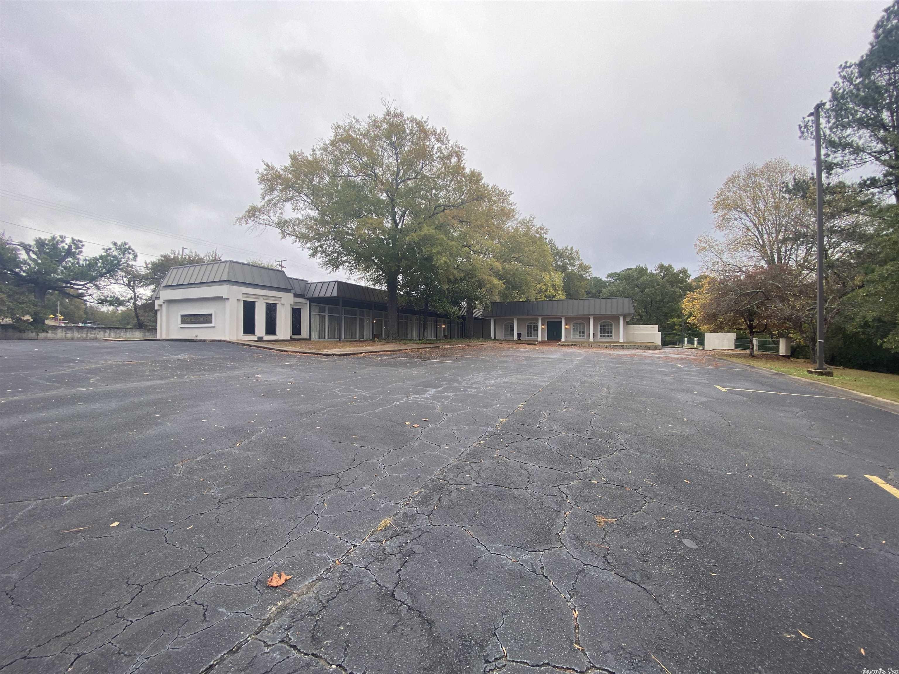 Large commercial office space in the heart of Bryant. Steps from Bryant High School. Survey online for reference purposes only. Call for more details.