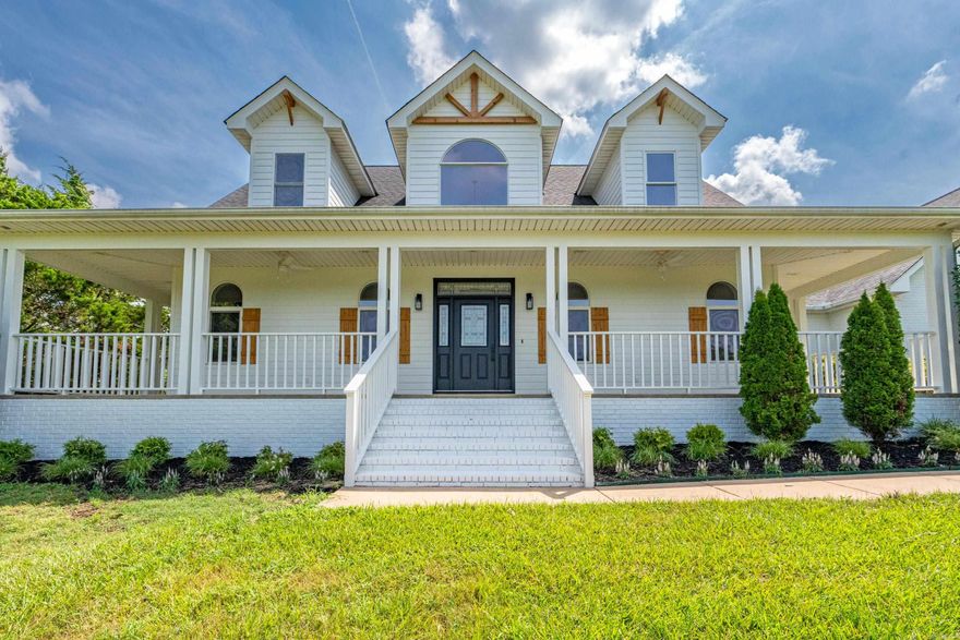 Experience refined country living in this stunning 3,038 sq ft estate, offering 4 spacious bedrooms, 3.5 baths and a versatile bonus room in a picturesque 3 acre setting. Fresh exterior paint, new landscaping,  and warm cedar accents create an unforgettable impression.  Inside a bright, open floor plan showcases elegant quartz countertops, luxury vinyl plank flooring, solid wood cabinetry, and thoughtfully designed living spaces perfect for entertaining or quiet evenings at home.  The large porch is ideal for enjoying morning coffee or sunset views, while the fenced area provides a secure area for pets.  A 2-car garage paired with a 2-car shop provides ample parking, storage, and hobby space. Recent upgrades include a new water heater, new flooring, counter tops, paint and many other upgrades. MOVE IN READY! Come enjoy the tranquility of country life and high end details.