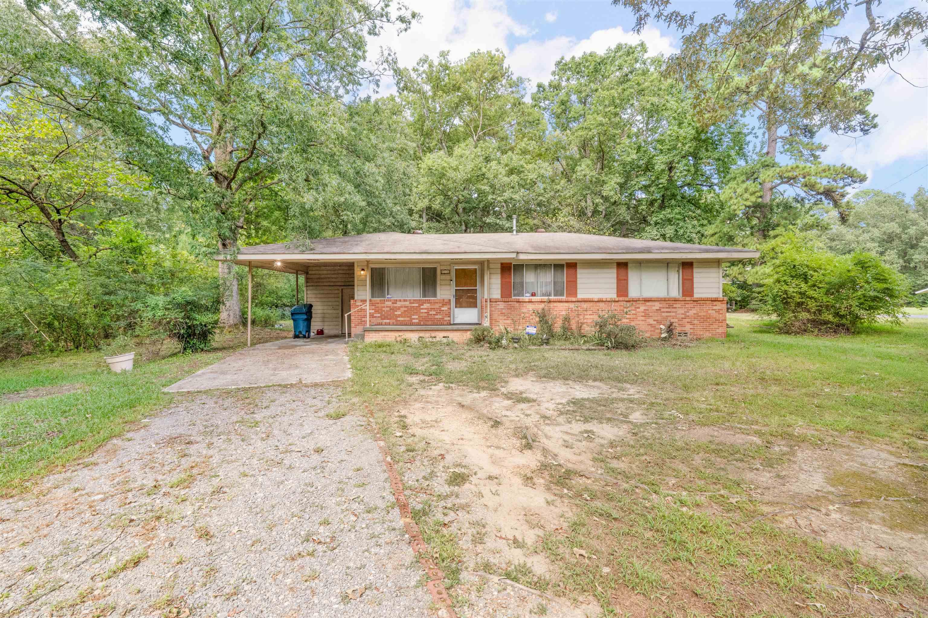 Nestled on a spacious .83-acre lot, this 3 bedroom 1 bath home offers endless potential with plenty of room to make it your own. Step inside to find cozy living spaces and the charm of original hardwood floors waiting to be uncovered beneath the carpet. The generous lot provides ample space for outdoor activities, gardening, or future expansion, giving you the perfect blend of comfort and opportunity. Whether you're a first-time buyer, an investor or someone ready to put their personal touch on a home, this property is a wonderful canvas. With its solid structure, vintage character, and large yard, it's full of possibilities. YOU DON'T WANT TO MISS THIS ONE!