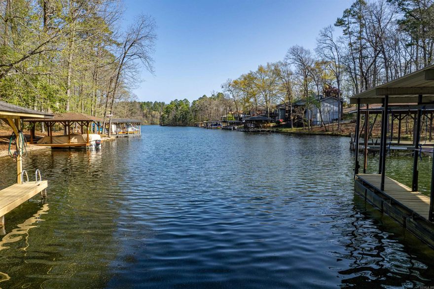 Build your dream home on this stunning 0.56-acre waterfront lot in the prestigious gated community of Hot Springs Village. With the seawall already in place level lake lot, this property offers direct lake access and breathtaking views. Enjoy serenity of lakeside living while benefiting from the community's top-tier amenities, including golf courses, hiking trails, restaurants, and more. Don't miss this rare opportunity to own a prime piece of lakefront real estate on Lake Cortez! Contact us today for more details!
