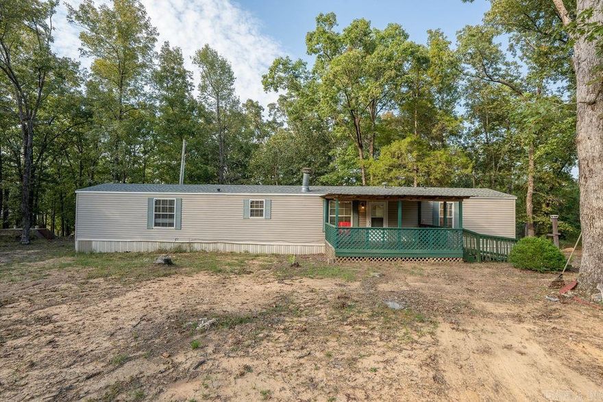 This 3 bedroom, 2 bath mobile home sits on 1.62 acres just minutes from the lake. Enjoy peace and privacy with room to spread out, plus the security of a storm shelter. A great spot for a weekend getaway or full-time home in the country.