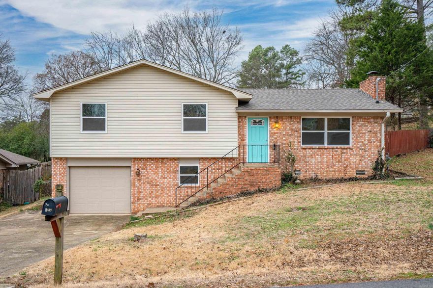 This beautifully remodeled 3-bedroom, 2-bath home offers modern updates throughout, including brand-new flooring, fresh walls, an upgraded kitchen, a new roof, and energy-efficient windows. The spacious multipurpose bonus room downstairs could easily serve as a 4th bedroom or additional living space to suit your needs. Key updates also include new kitchen plumbing and electrical improvements, adding significant value to this home. Enjoy the outdoors on the newly renovated deck overlooking the backyard. Conveniently located near shopping, medical offices, dining, and Oaklawn, this home combines comfort, functionality, and prime location.