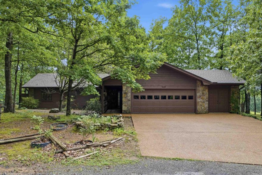 Rare opportunity to own a one-owner custom home on Indian Hills Golf Course. Built by a highly respected local builder & thoughtfully designed by a renowned Fairfield Bay architect, this exceptional property offers 1.48 acres with the rare combination of golf course frontage & beautiful pond/lakeviews.  Designed for comfortable, step-free living, this well-maintained home showcases beautiful wood floors, solid wood doors, quality Anderson windows, & a stunning floor-to-ceiling stone fireplace. The spacious sunroom provides the perfect place to enjoy nature, wildlife, & peaceful golf course views. A practical floor plan includes a generous pantry & utility room, while golf enthusiasts will appreciate the workshop & dedicated golf cart storage. The Indian Hills Pro Shop, Restaurant, & Driving Range are just a short golf cart ride away. Pride of ownership is evident throughout this meticulously cared-for home. Recent improvements include a newer roof & water heaters, providing peace of mind for years to come. Offering quality craftsmanship, exceptional maintenance, and an unbeatable golf course setting, thiis is a rare property you won't want to miss the opportunity to view.
