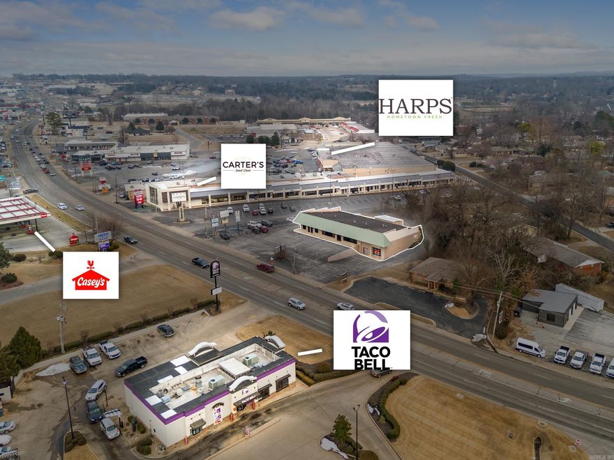 This high-visibility commercial property offers approximately 7,200 sq. ft. of flexible space, perfect for your business with plenty of room to grow—or lease out for additional income. Situated on 0.88 AC M/L, this property features 5 spacious showrooms, 7 offices, and 5 separate half-baths, ensuring functionality for a variety of business types. Equipped with 4 HVAC units, 4 electric meters, and a slanted rubberized roof, it’s built for efficiency and convenience. Plus, a 16x28 storage building in the rear provides extra space for inventory or equipment. Don’t miss this prime commercial opportunity—bring your vision and make it yours today!