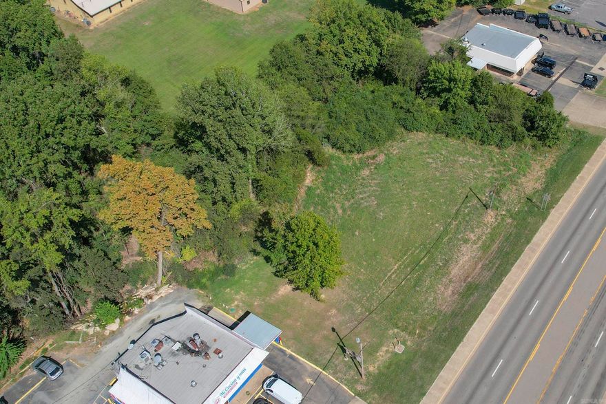 Discover a prime commercial land opportunity on Collin Raye Dr in DeQueen, AR. This strategically located lot offers high visibility and significant traffic flow, making it an ideal spot for your new business venture. With close proximity to local amenities and attractions, whether you're considering retail, dining, or service-oriented businesses, the possibilities are endless. Don’t miss out on this rare chance to invest in the future of DeQueen—contact us today to learn more about this exceptional opportunity!