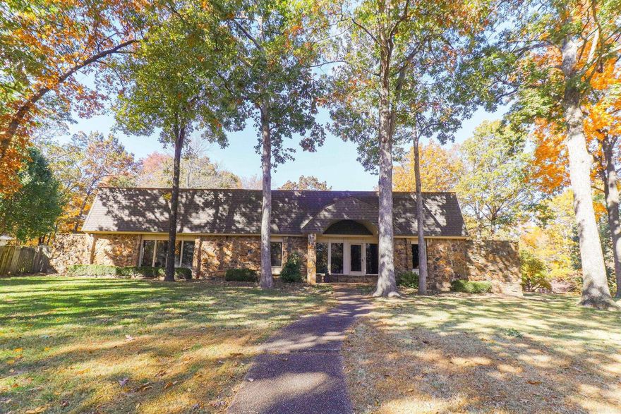 Beautiful 3-bedroom, 4.5-bath home on a corner lot surrounded by mature shade trees in the desirable Rankin's Oak Forest neighborhood, just south of the bypass. This spacious property offers the perfect blend of classic character and modern updates, featuring two living areas, two fireplaces with gas logs, and a large 30x40 shop with new roof (2025), air compressor, and RV pad with dump connection. Step inside to find inviting living spaces including a sunken family room with stone fireplace, a bright second living area, and two dining rooms ideal for entertaining. The updated kitchen features granite countertops, Thermador cooktop with downdraft, built-in microwave, and all appliances stay including washer, dryer, and even the air compressor in the shop. The main-level primary suite is a true retreat with dual bathrooms, two walk-in closets, and plantation shutters. Upstairs bedrooms feature a convenient laundry chute to the main-level laundry room, which also includes a built-in desk. Additional highlights include a 7-zone sprinkler system, attached 2-car garage, stone and vinyl exterior, and a mix of LVP, tile, and carpet flooring.