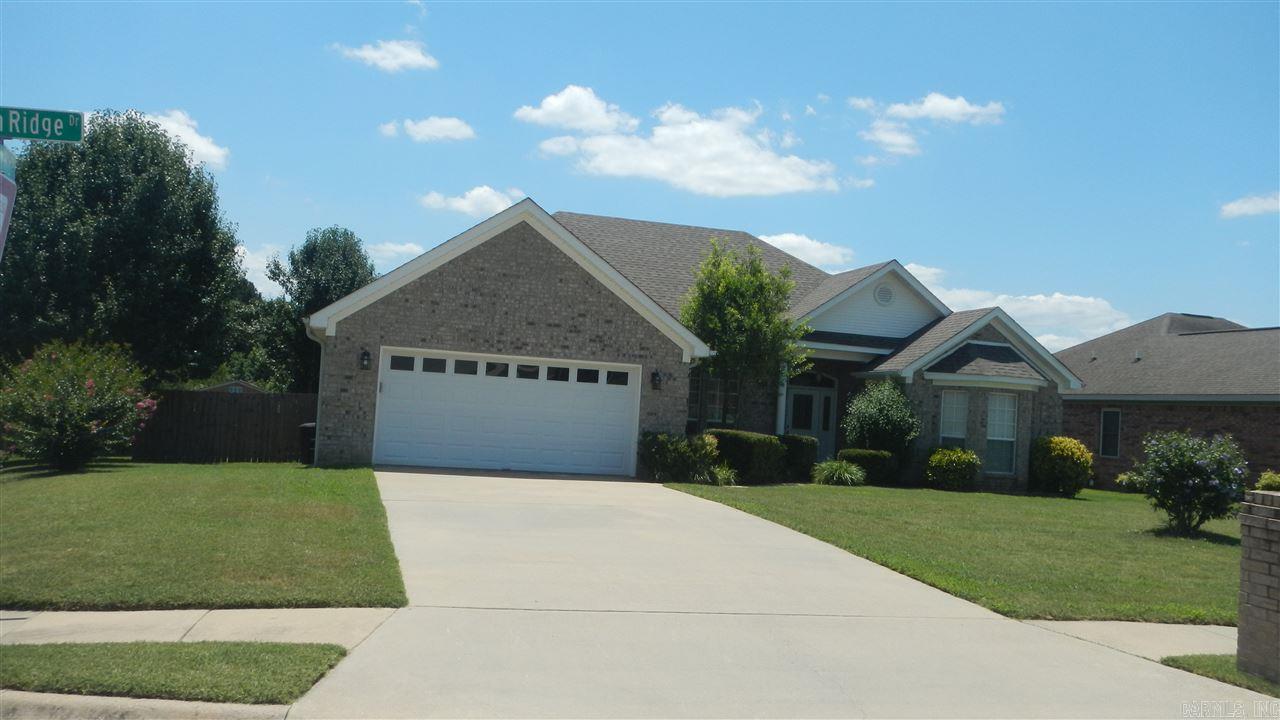 Ready to move in. Corner lot 1 level 3 bedroom, 2 bathroom home. Split BR plan, master bath offers double sinks, walk-in shower,walk-in closet, jetted tub and pan ceiling. Roof less than 2 yrs. Appliances 3 years. Great room has gas log fireplace,pan ceiling w/recessed lighting, separate dining area. Eat in Kitchen and breakfast bar. Privacy fenced back yard with deck and storage building. Ceiling fans and gutters. Work bench in garage does not convey.