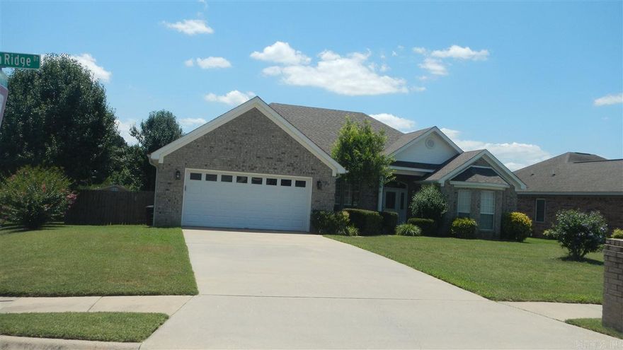 Ready to move in. Corner lot 1 level  3 bedroom, 2 bathroom home. Split BR plan, master bath offers double sinks, walk-in shower,walk-in closet, jetted tub and pan ceiling. Roof less than 2 yrs.  Appliances 3 years. Great room has gas log fireplace,pan ceiling w/recessed lighting, separate dining area. Eat in Kitchen and breakfast bar.  Privacy fenced back yard with deck and storage building. Ceiling fans and gutters.  Work bench in garage does not convey.