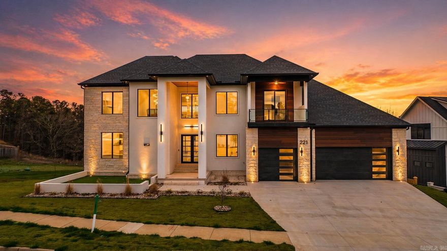 Stunning new construction in the Falstone subdivision of Chenal Valley! This impressive 3-level home with a walkout basement offers exceptional design and energy efficiency. The main living area features soaring two-story ceilings and oversized Pella Lifestyle Series windows, including large picture windows and quad sliding doors that flood the home with natural light. The chef’s kitchen includes GE Café appliances, ceiling-height cabinetry, and a butler’s pantry with beverage cooler.  Built for efficiency and comfort with spray-foam encapsulated attic insulation, high-efficiency Trane variable-speed HVAC systems (18 SEER, 95%+ AFUE furnaces), and a tankless water heater. The home includes 5 full baths and 1 half bath, with custom tiled showers and tiled tub surrounds.  Enjoy incredible entertaining spaces including a finished main-level balcony, outdoor kitchen, and a huge covered and open patio from the walkout basement featuring a wet bar with beverage cooler. The property offers a two-level front porch, glass railings, LED stair lighting, wired security, large front and side yards, and a private greenbelt backdrop for added privacy.