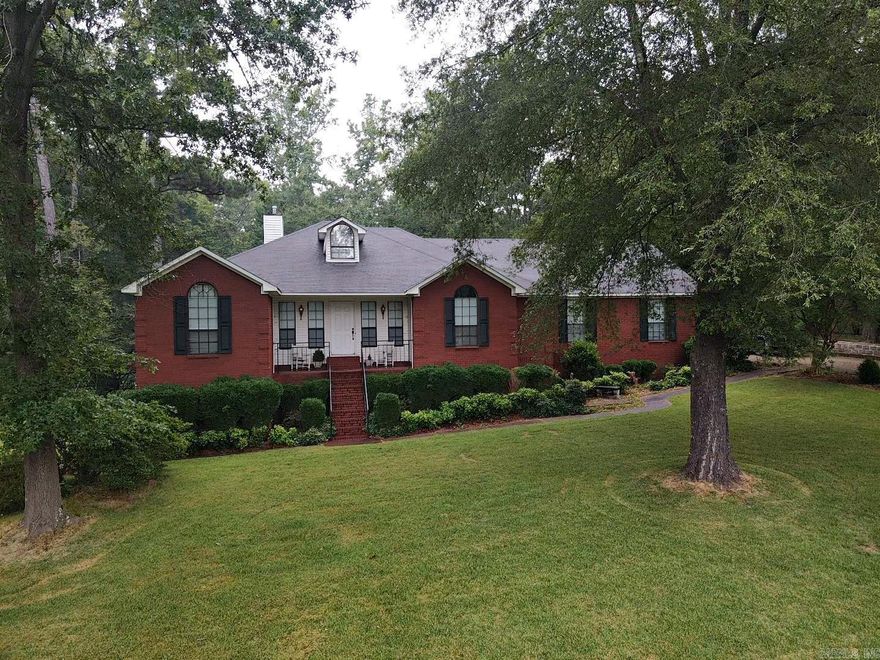 Beautiful home sitting on two corner lots surrounded by mature trees and majestic landscape.  This home is so inviting both inside and out; awesome views from inside the dining, living areas or the back deck while entertaining.  Split floorplan, with master suite off the kitchen and two bedrooms on the opposite side of home.  One of the bedrooms has a private sunporch with access to the back deck. Gazebo overlooks the terraced flower gardens, large basement area for storage and workshop, attic space for storage or future expansion.